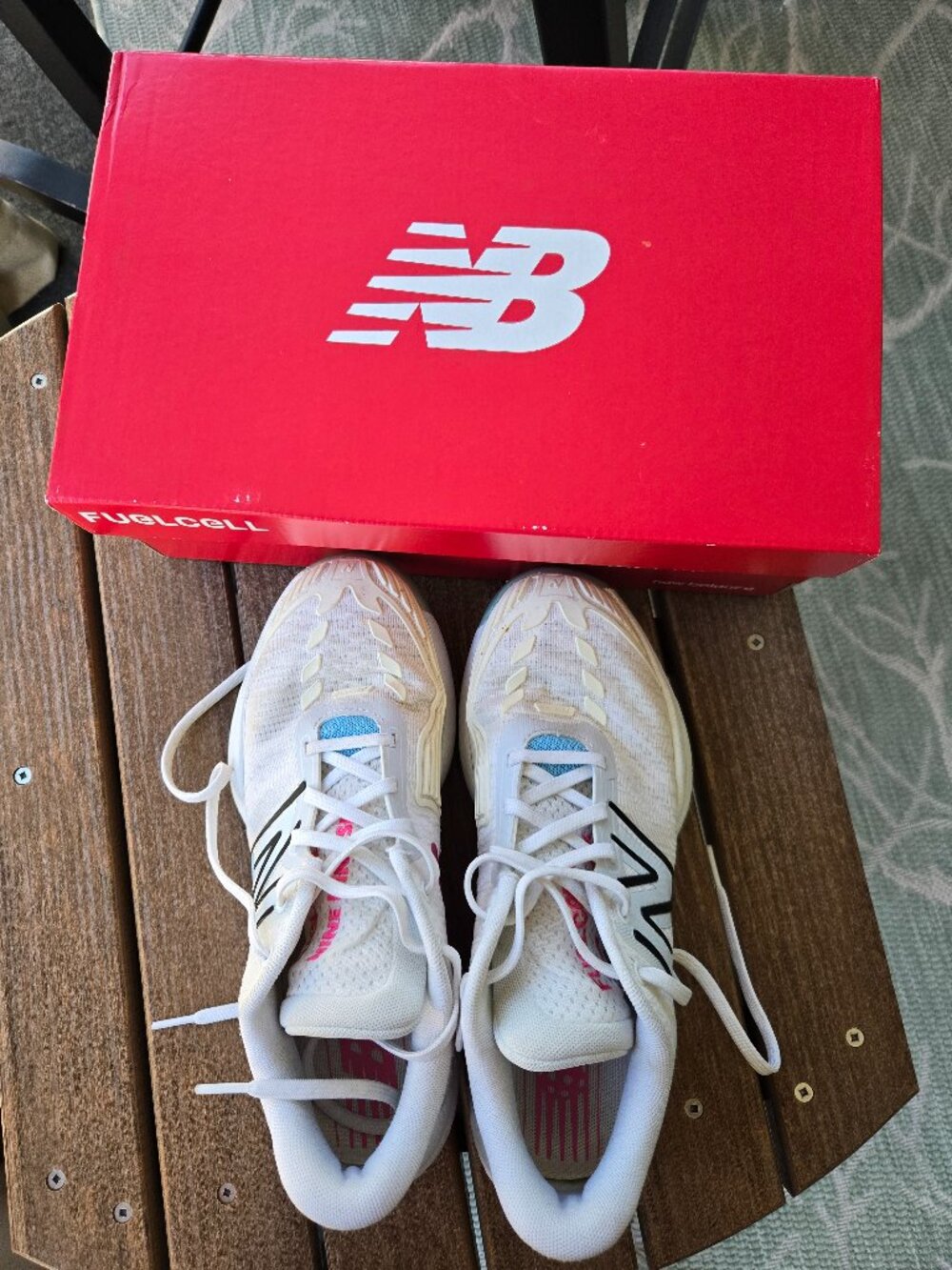 Gently used women's white New Balance pickleball shoes, size 9 med.